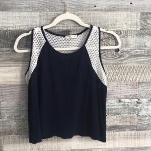Navy tank with white eyelit detailing!